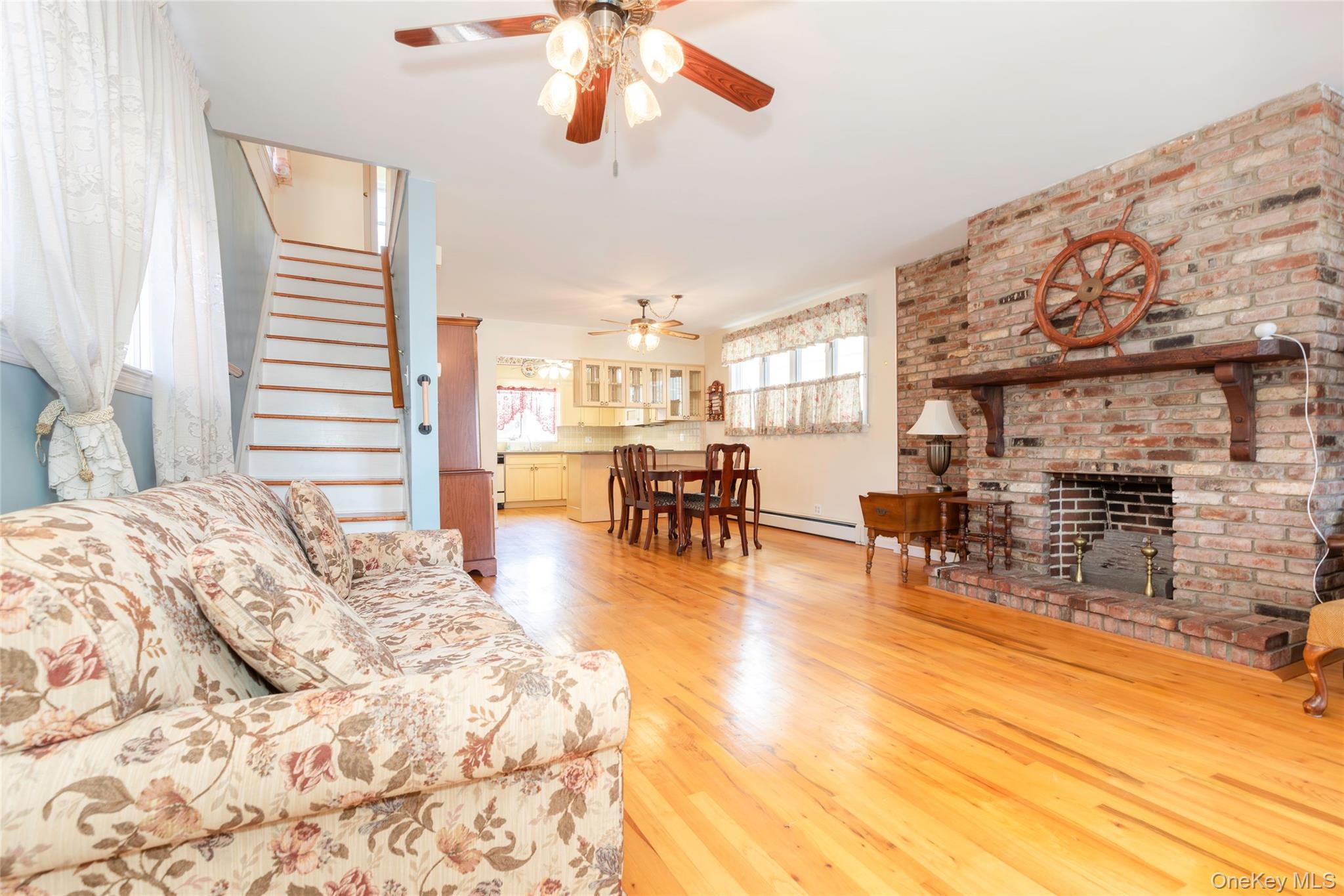 100 Marine Street Bronx, NY 10464 - Photo 3 of 25 a view of a livingroom with furniture and a kitchen