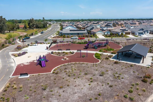 a bathroom with a mirror sink and window