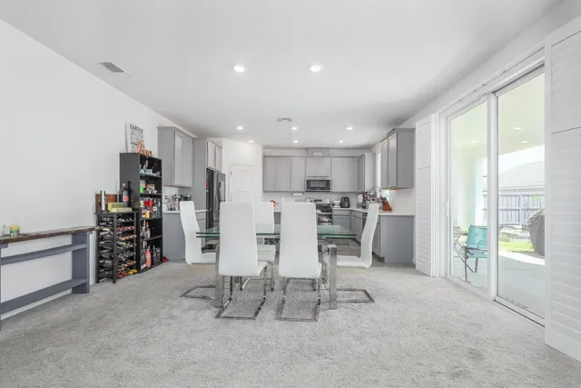 a view of a kitchen with furniture and a area