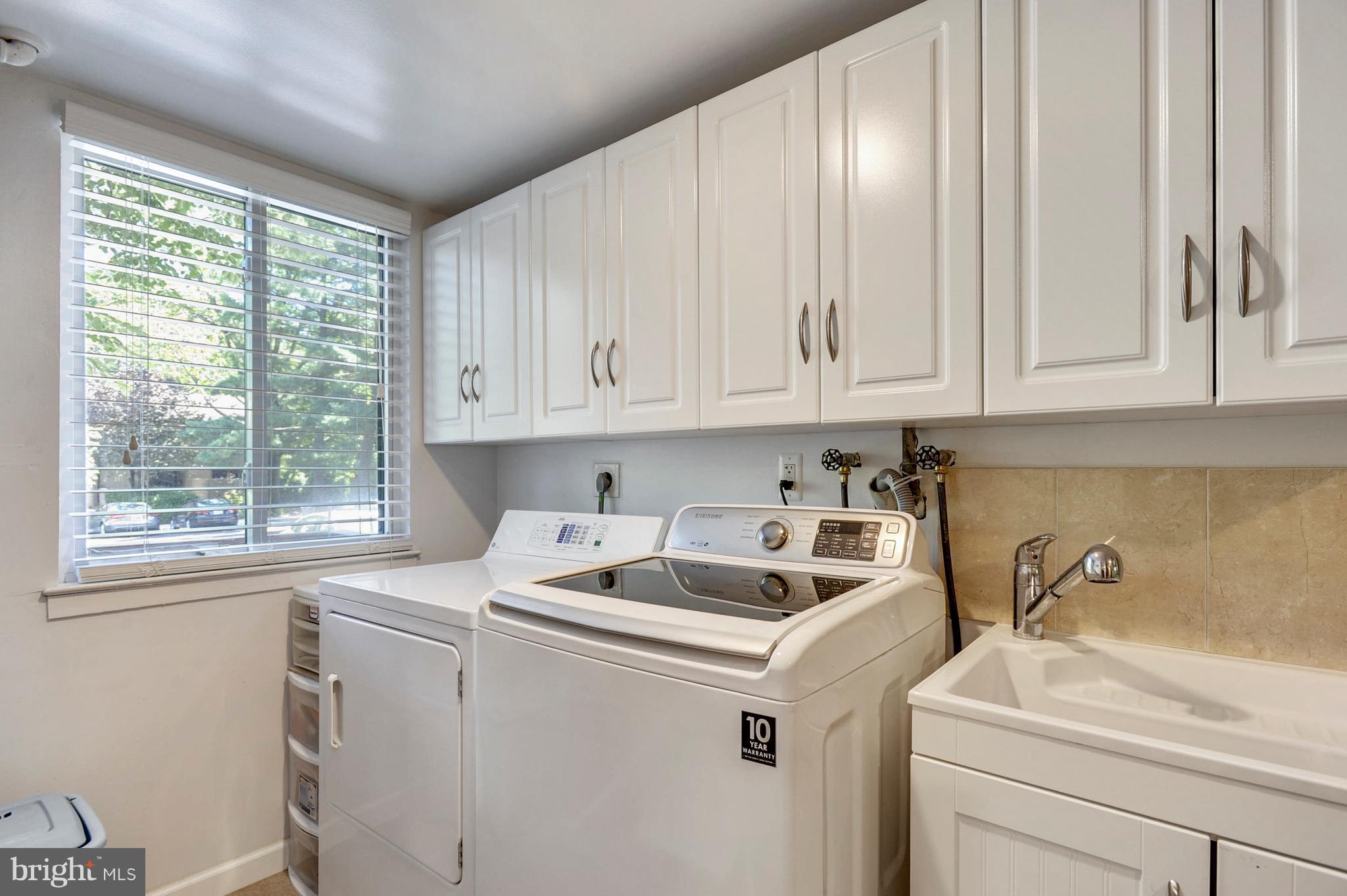 11796 Indian Ridge Road Reston, VA 20191 - Photo 13 of 30 a utility room with dryer and washer