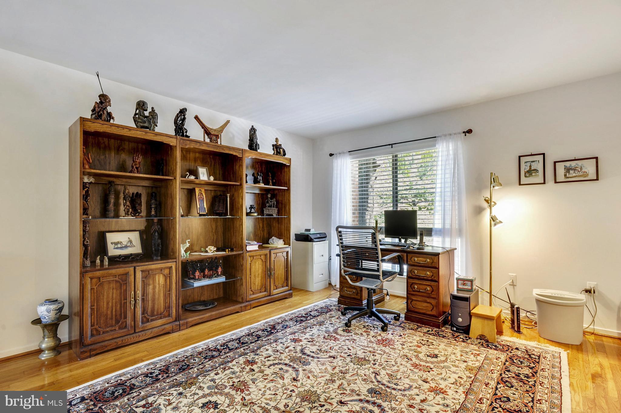 11796 Indian Ridge Road Reston, VA 20191 - Photo 18 of 30 a view of a workspace with furniture and window
