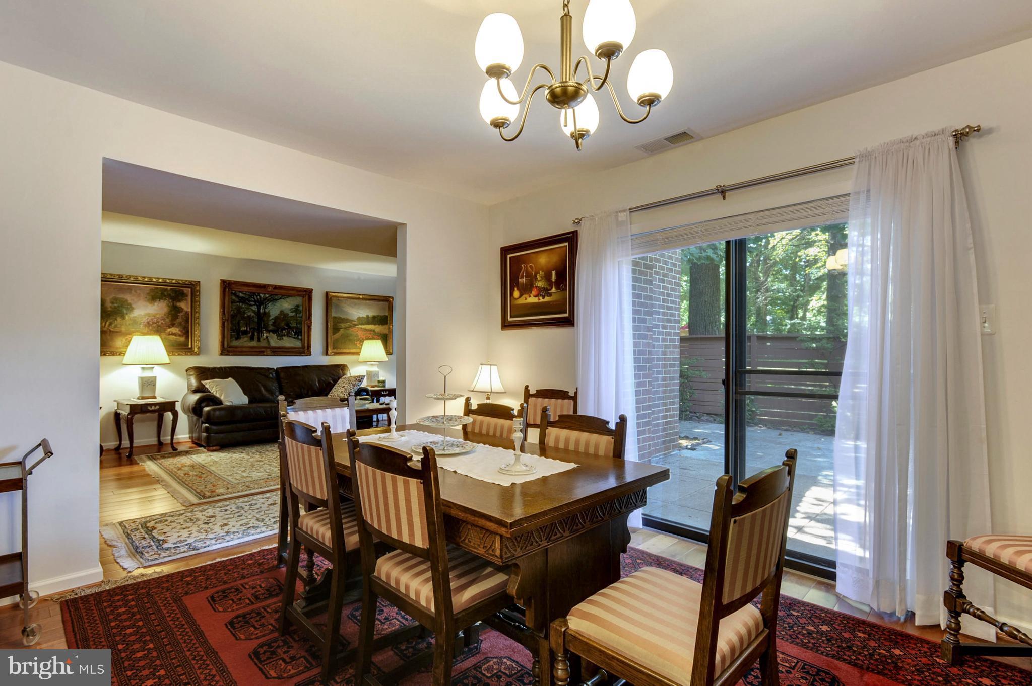 11796 Indian Ridge Road Reston, VA 20191 - Photo 8 of 30 a view of a dining room with furniture window and outside view