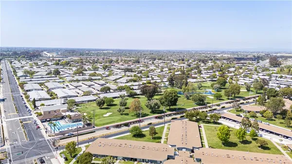 an aerial view of a city with lots of residential buildings