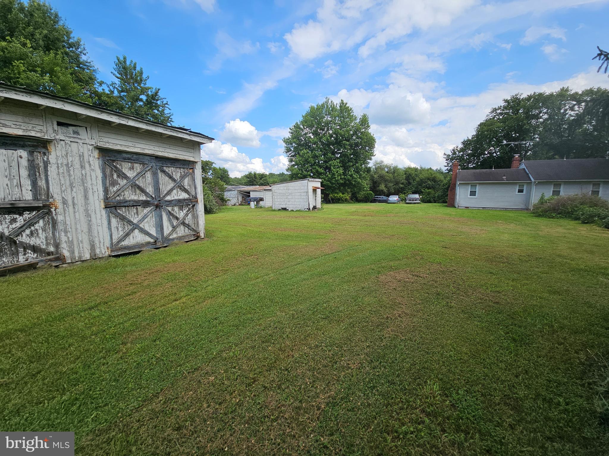 11145 Brent Town Road Catlett, VA 20119 - Photo 25 of 56 Back of home showing outbuildings