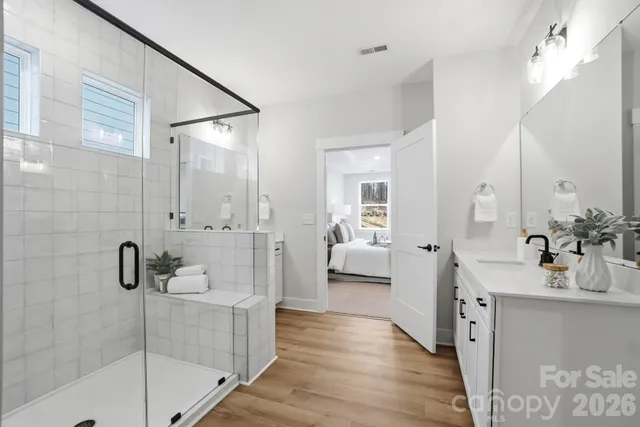 a bathroom with a shower bathtub and window