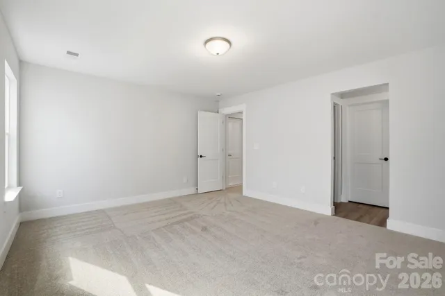 a bathroom with a sink and vanity