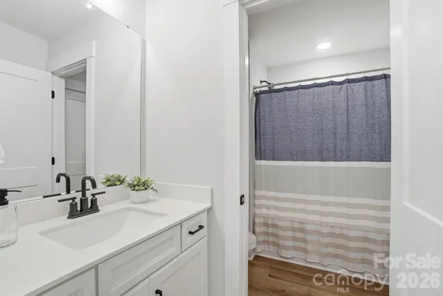 a view of a dining room with furniture and window
