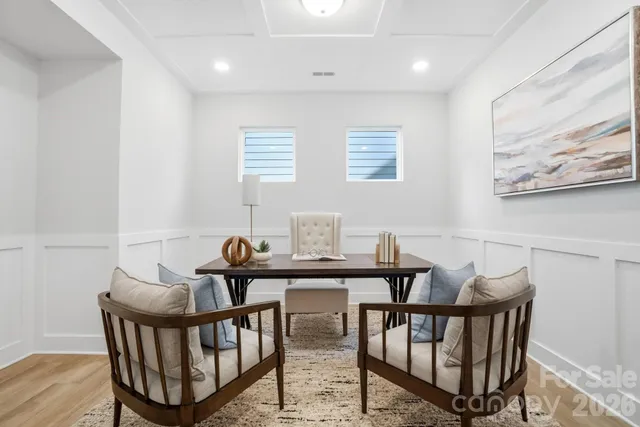 a view of a dining table and chairs in a room