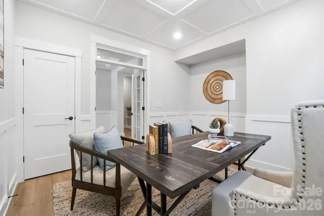 an empty room with large windows