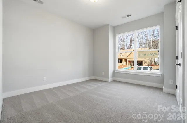 a bathroom with a sink mirror toilet and shower