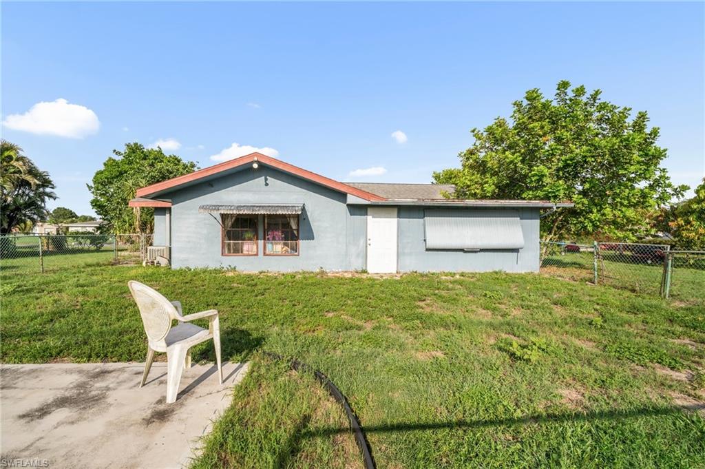 115 Georgia Road Lehigh Acres, FL 33936 - Photo 26 of 26 View of rear view of house