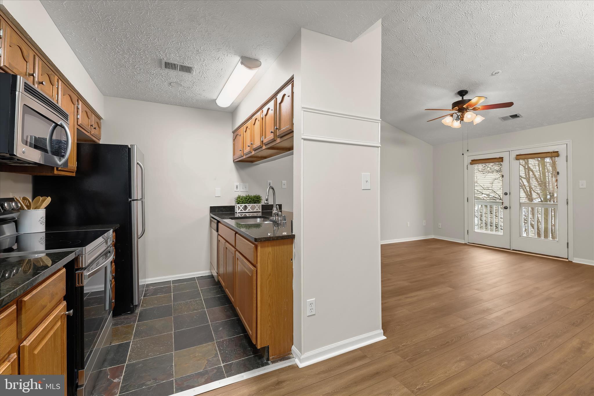 6420 Greenfield Road, Unit 810 Elkridge, MD 21075 - Photo 16 of 35 Kitchen open to Living Room