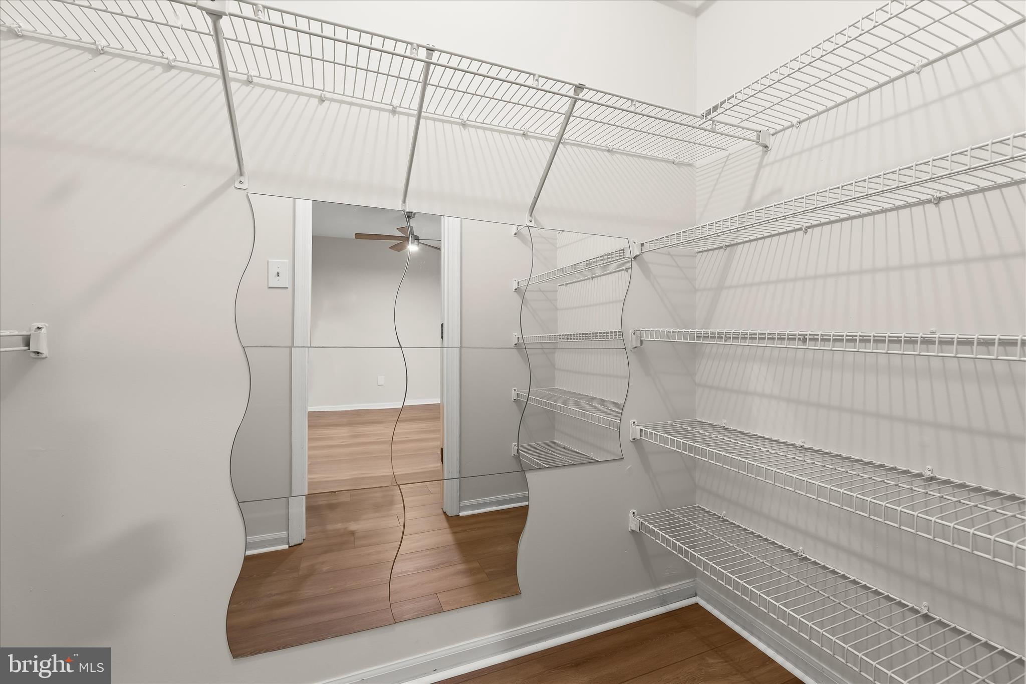 6420 Greenfield Road, Unit 810 Elkridge, MD 21075 - Photo 21 of 35 Primary Bedroom Walk-in Closet