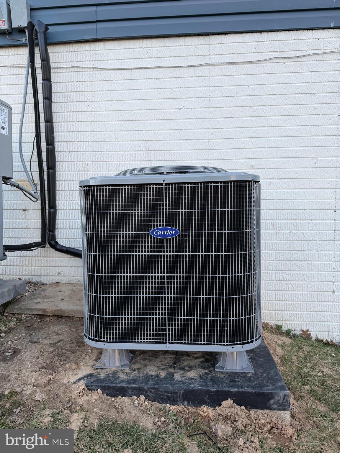 6420 Greenfield Road, Unit 810 Elkridge, MD 21075 - Photo 31 of 35 Newly installed HVAC Exterior Unit (3/6/2026)