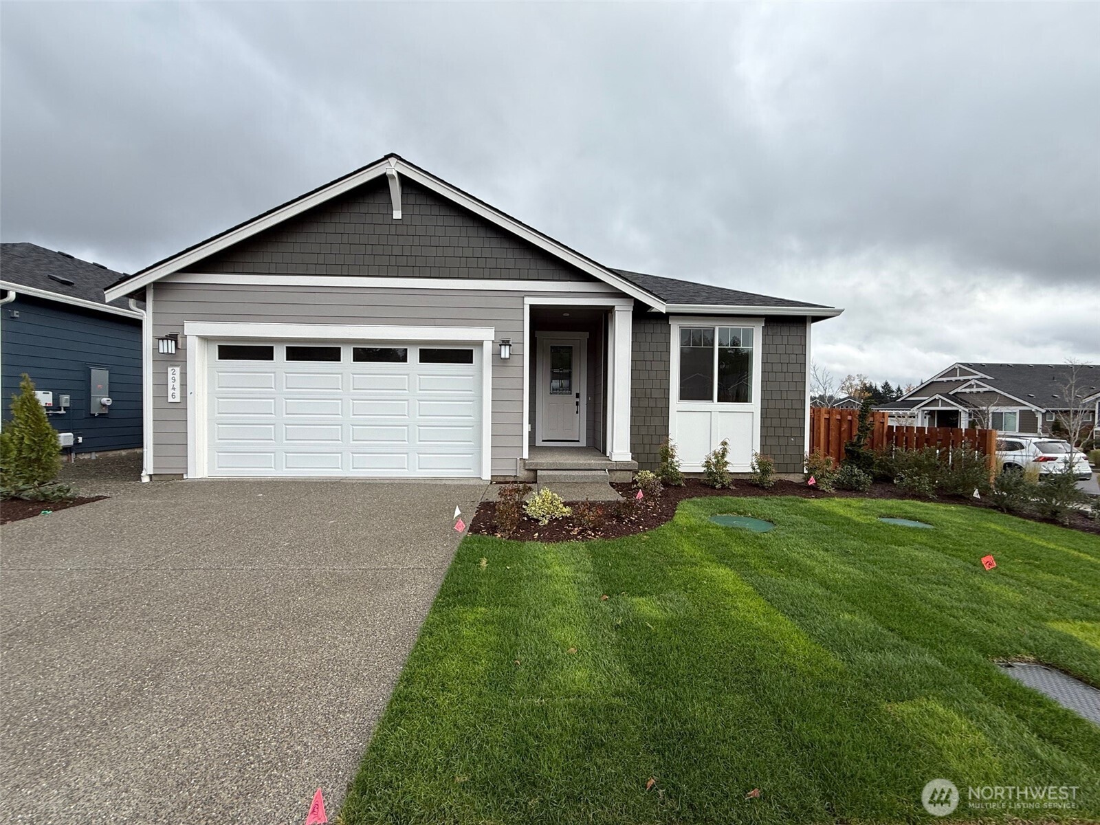 2946 Balsamroot Drive Southeast Lacey, WA 98513 - Photo 1 of 22 a front view of house with yard and green space