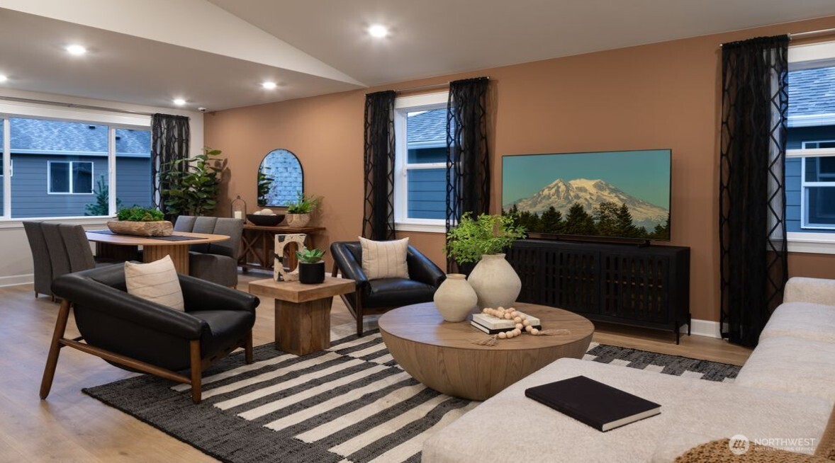 2946 Balsamroot Drive Southeast Lacey, WA 98513 - Photo 8 of 22 a living room with furniture and a potted plant