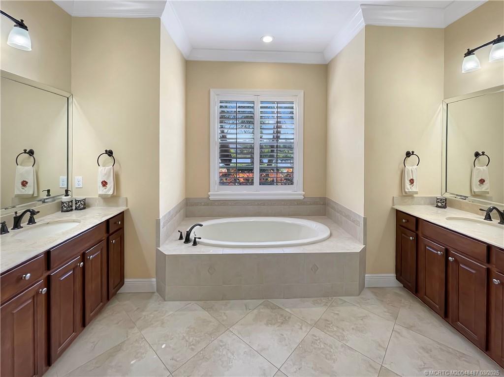 443 Southwest Lost River Road Stuart, FL 34997 - Photo 24 of 34 Main bath vanities & tub