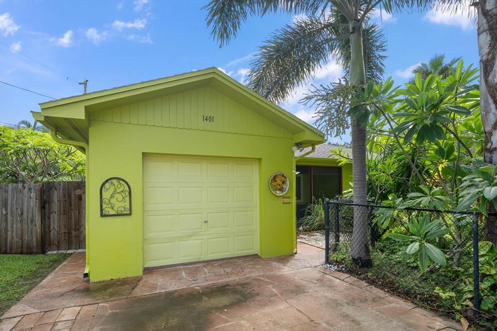 1401 Bay Palm Boulevard Indian Rocks Beach, FL 33785 - Photo 1 of 1 a front view of a house with a garden