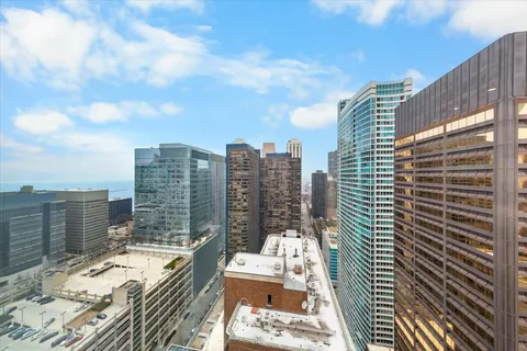 a view of city with tall buildings