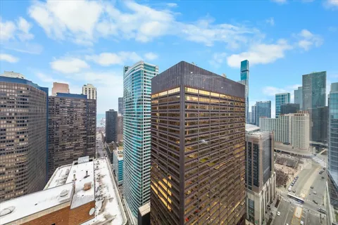a view of a city with tall buildings