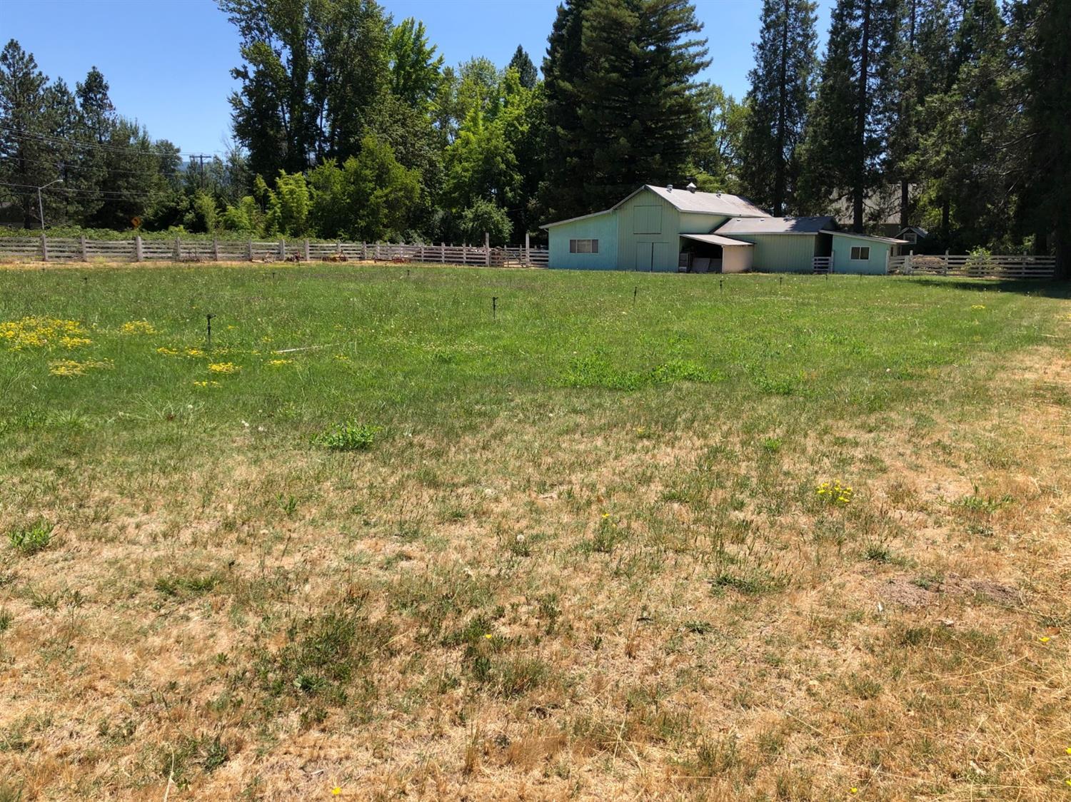 2368 Upper River Road Grants Pass, OR 97526 - Photo 29 of 30 a view of a house with a yard and sitting area