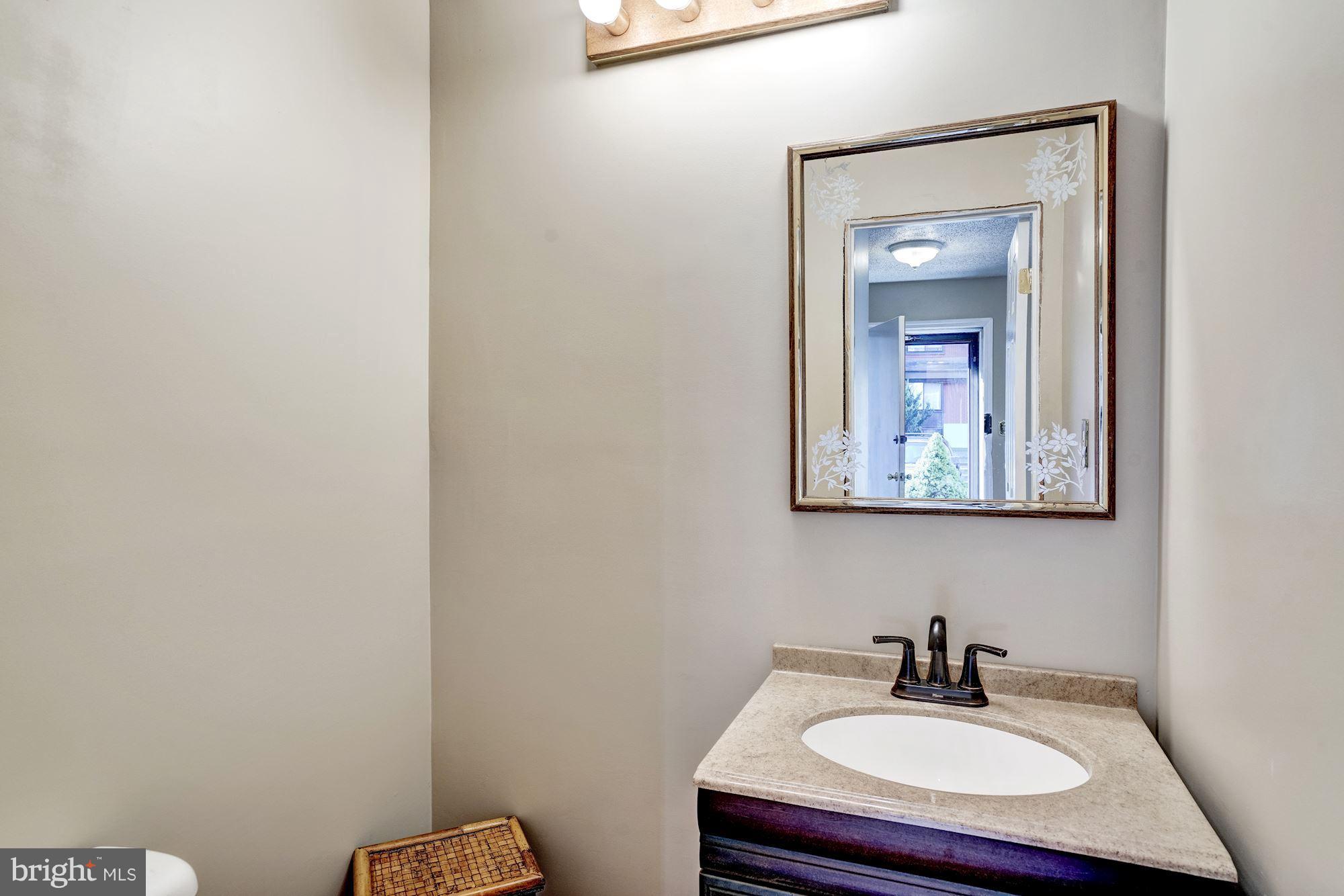 2254 Coppersmith Square Reston, VA 20191 - Photo 10 of 25 Remodeled Half Bath on Main Level