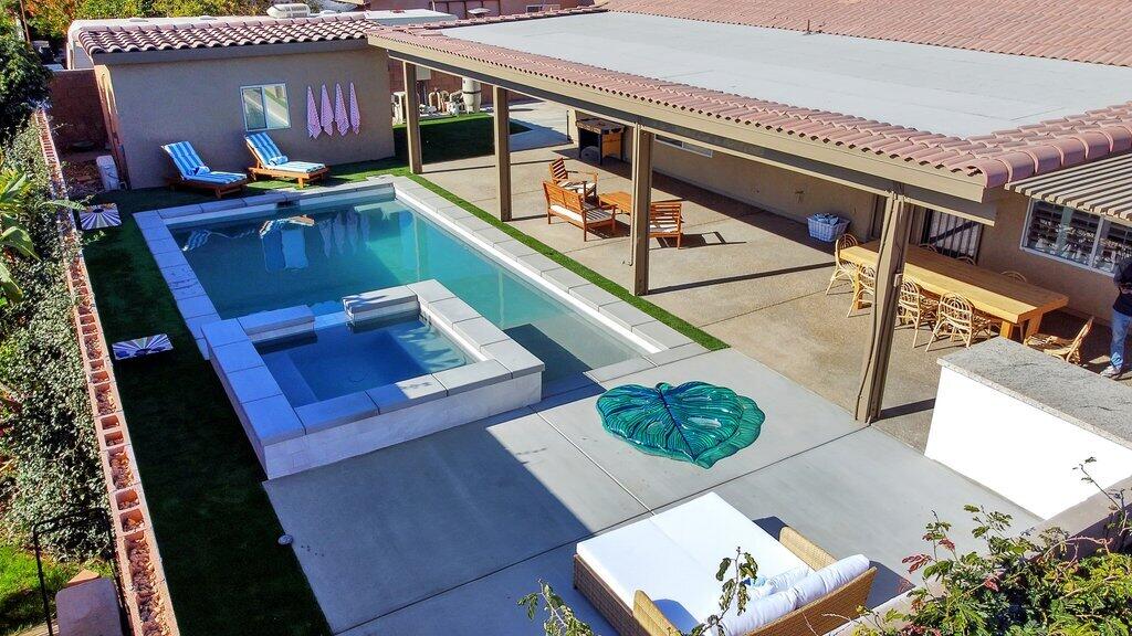 83347 Mango Walk Indio, CA 92201 - Photo 1 of 49 a view of a two chairs in the balcony