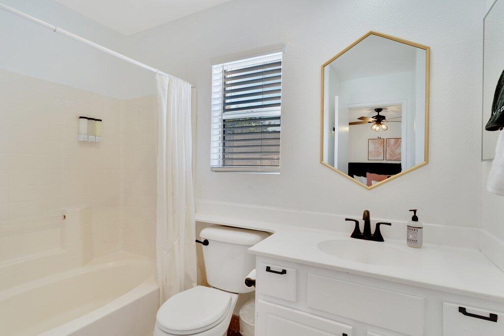 83347 Mango Walk Indio, CA 92201 - Photo 34 of 49 a bathroom with a sink a toilet and shower