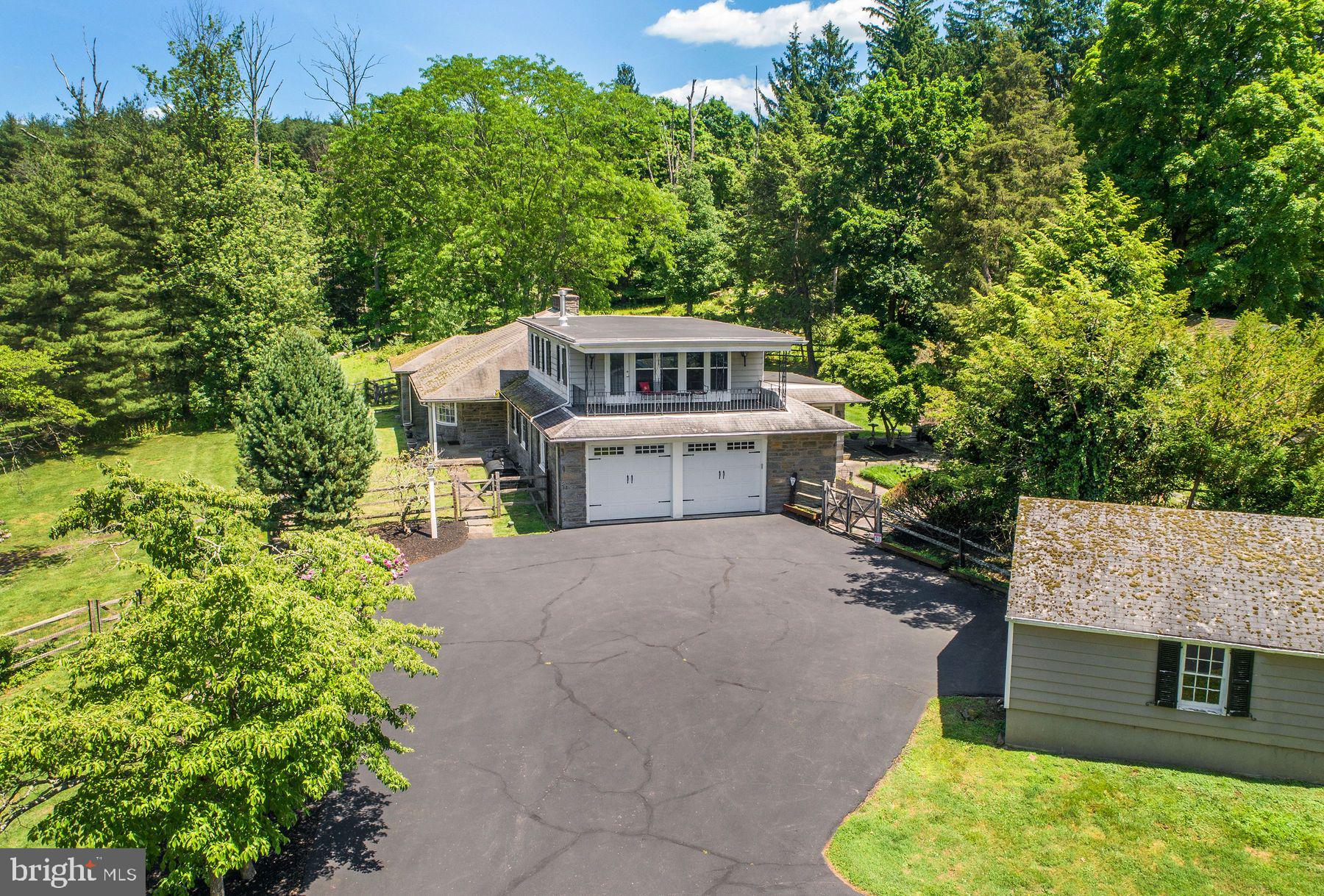 2349 Valley Road Jamison, PA 18929 - Photo 5 of 53 a front view of a house with a garden
