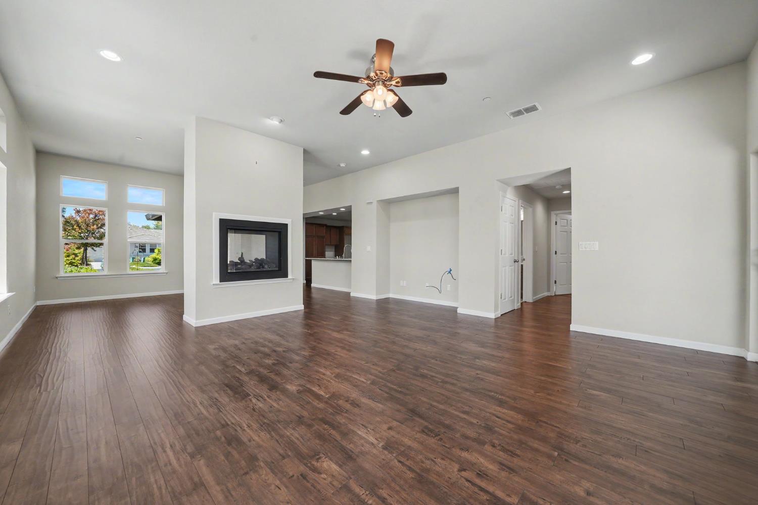 159 Emerald Lane Jackson, CA 95642 - Photo 15 of 58 wooden floor in an empty room with a window