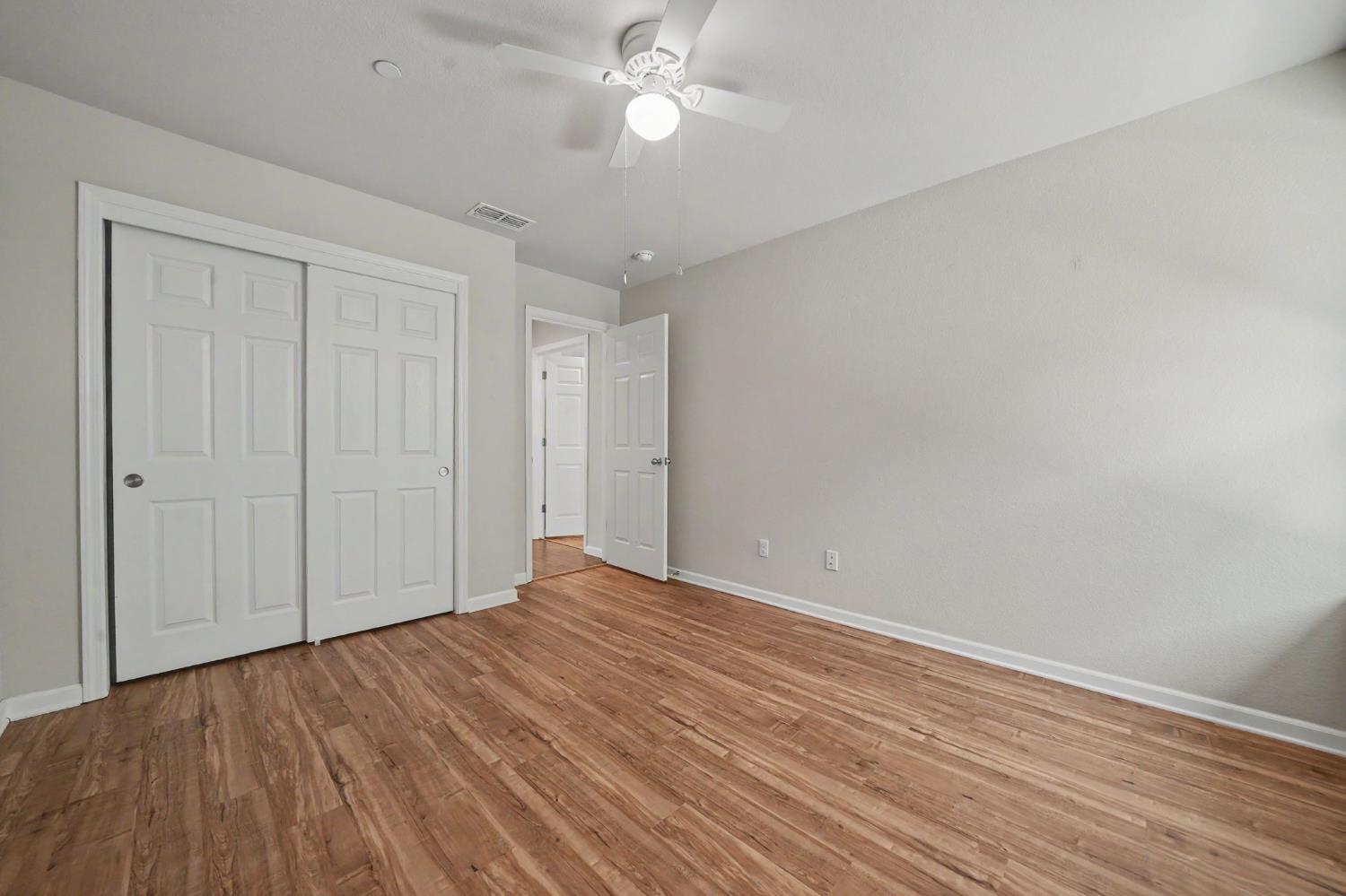 159 Emerald Lane Jackson, CA 95642 - Photo 29 of 58 a view of empty room with wooden floor