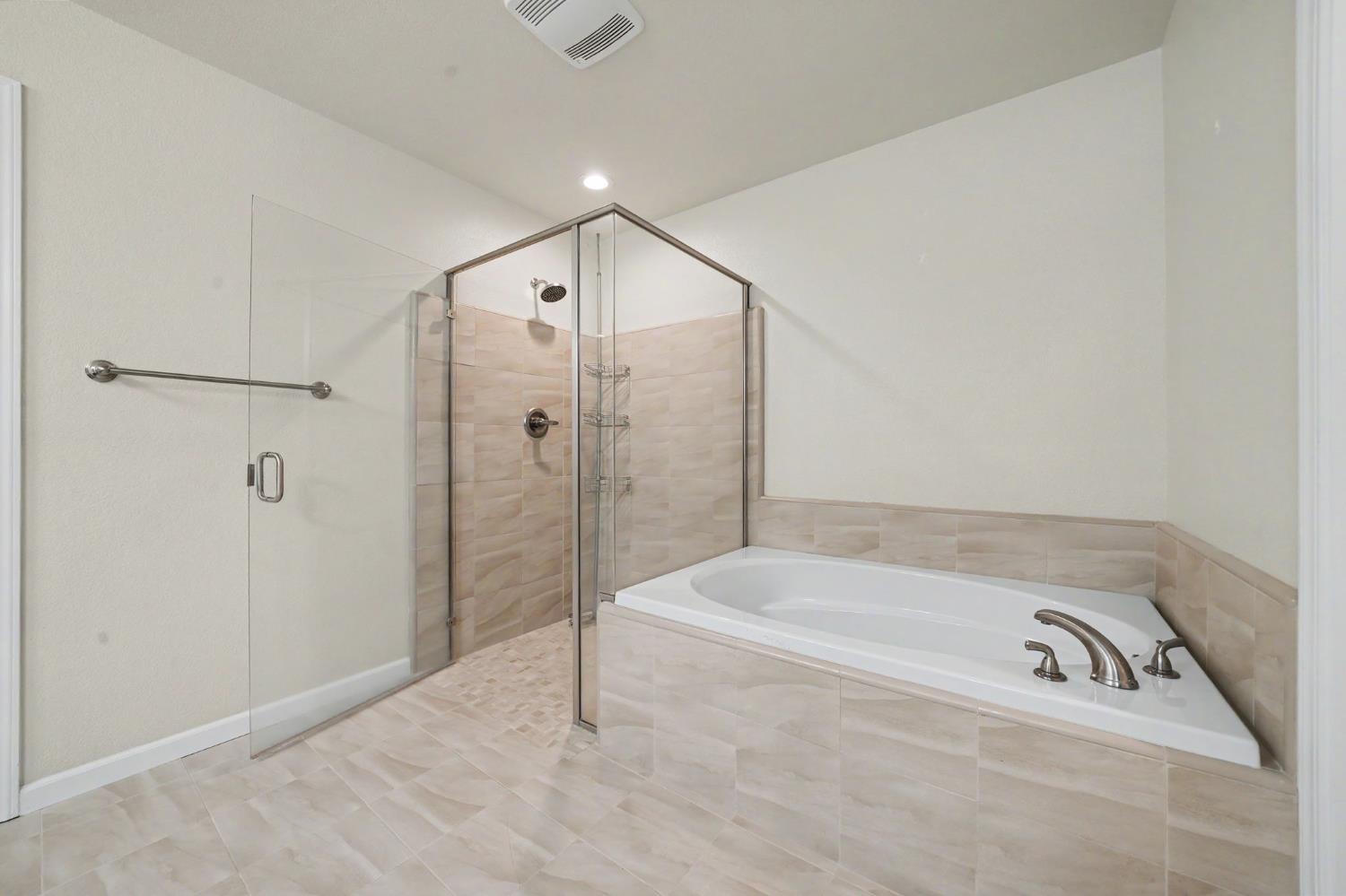 159 Emerald Lane Jackson, CA 95642 - Photo 34 of 58 a spacious bathroom with a tub and a shower