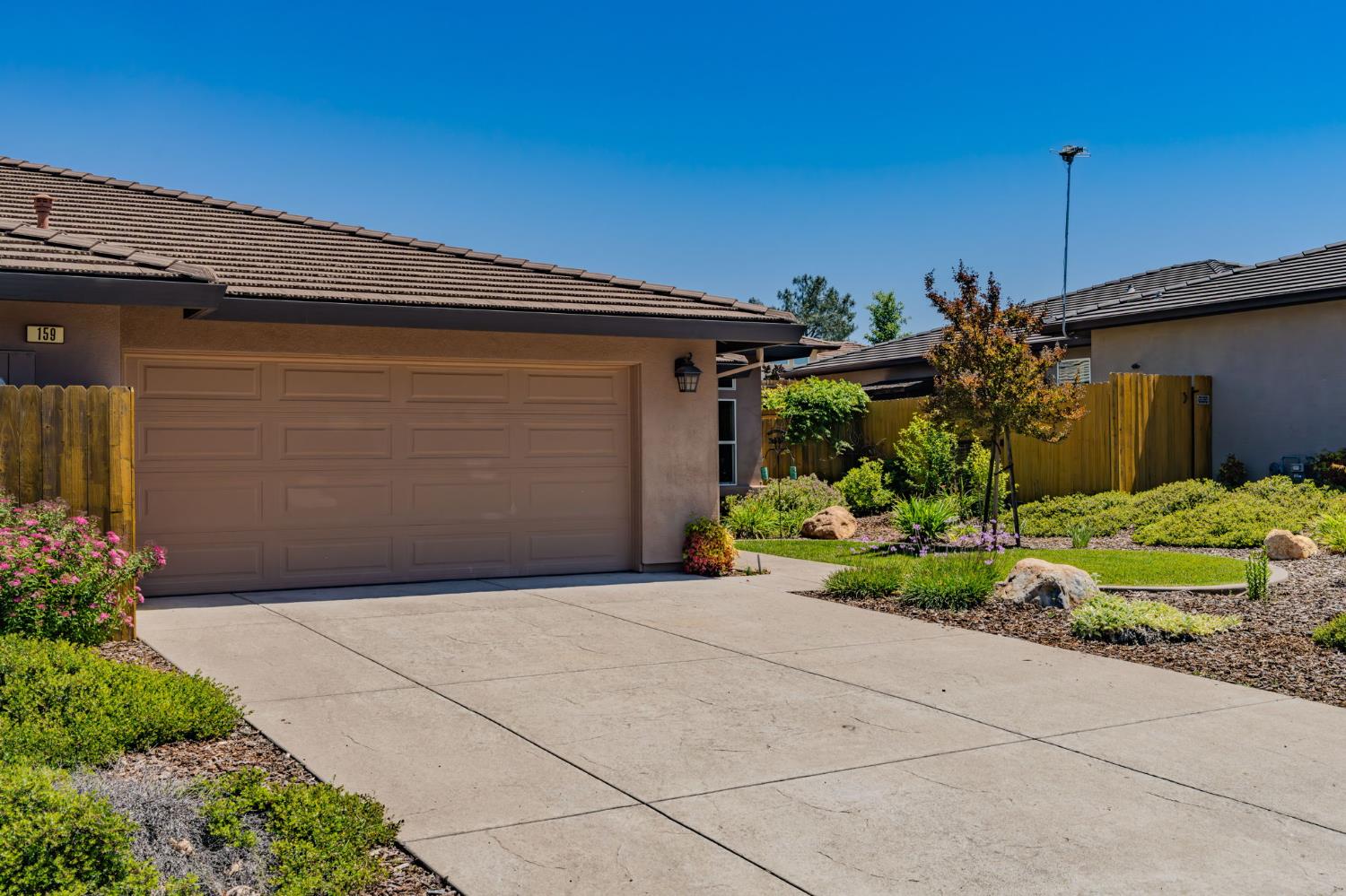 159 Emerald Lane Jackson, CA 95642 - Photo 4 of 58 a front view of a house with a yard
