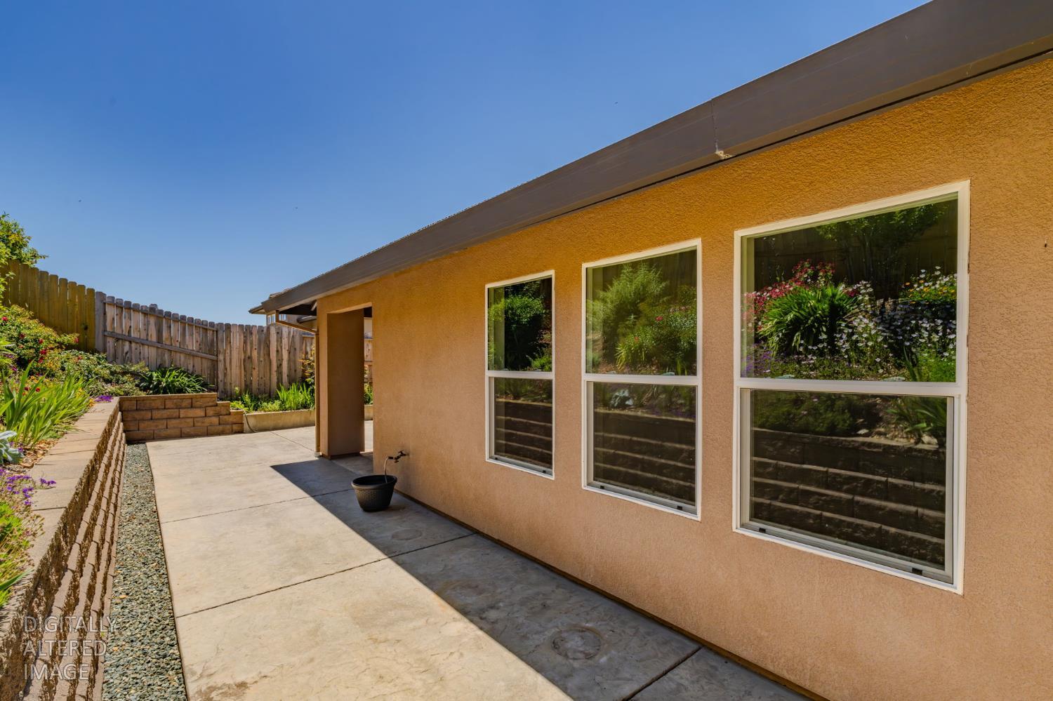 159 Emerald Lane Jackson, CA 95642 - Photo 45 of 58 a backyard of a house with seating space