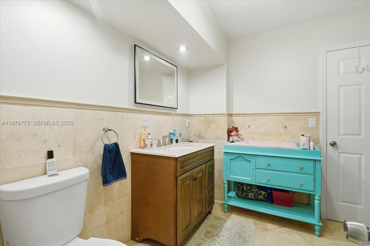 4925 Tyler Street Hollywood, FL 33021 - Photo 34 of 55 a utility room with dryer and washer
