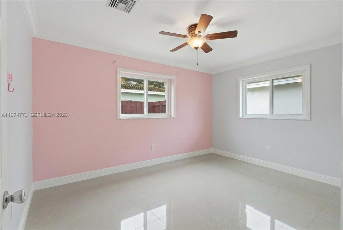 4925 Tyler Street Hollywood, FL 33021 - Photo 53 of 55 an empty room with a window