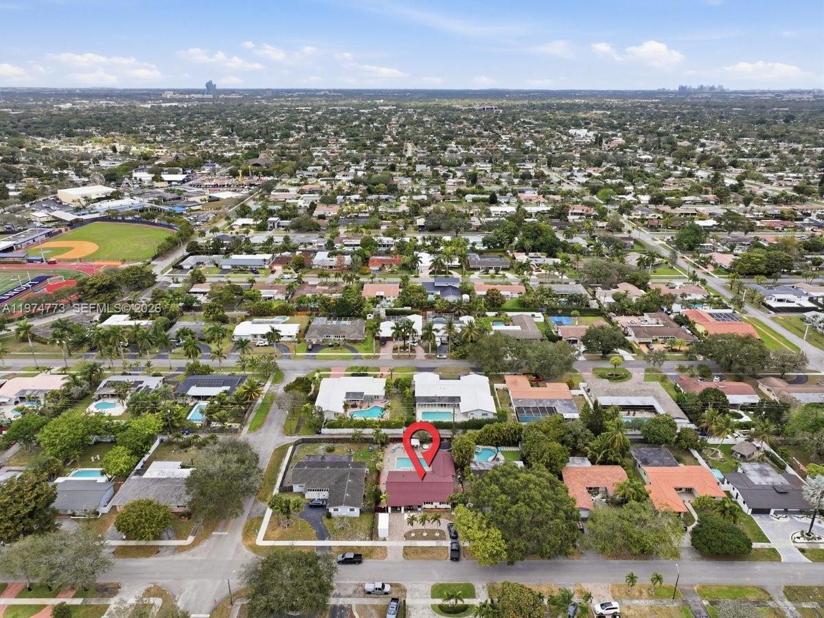 4925 Tyler Street Hollywood, FL 33021 - Photo 55 of 55 an aerial view of residential houses with outdoor space