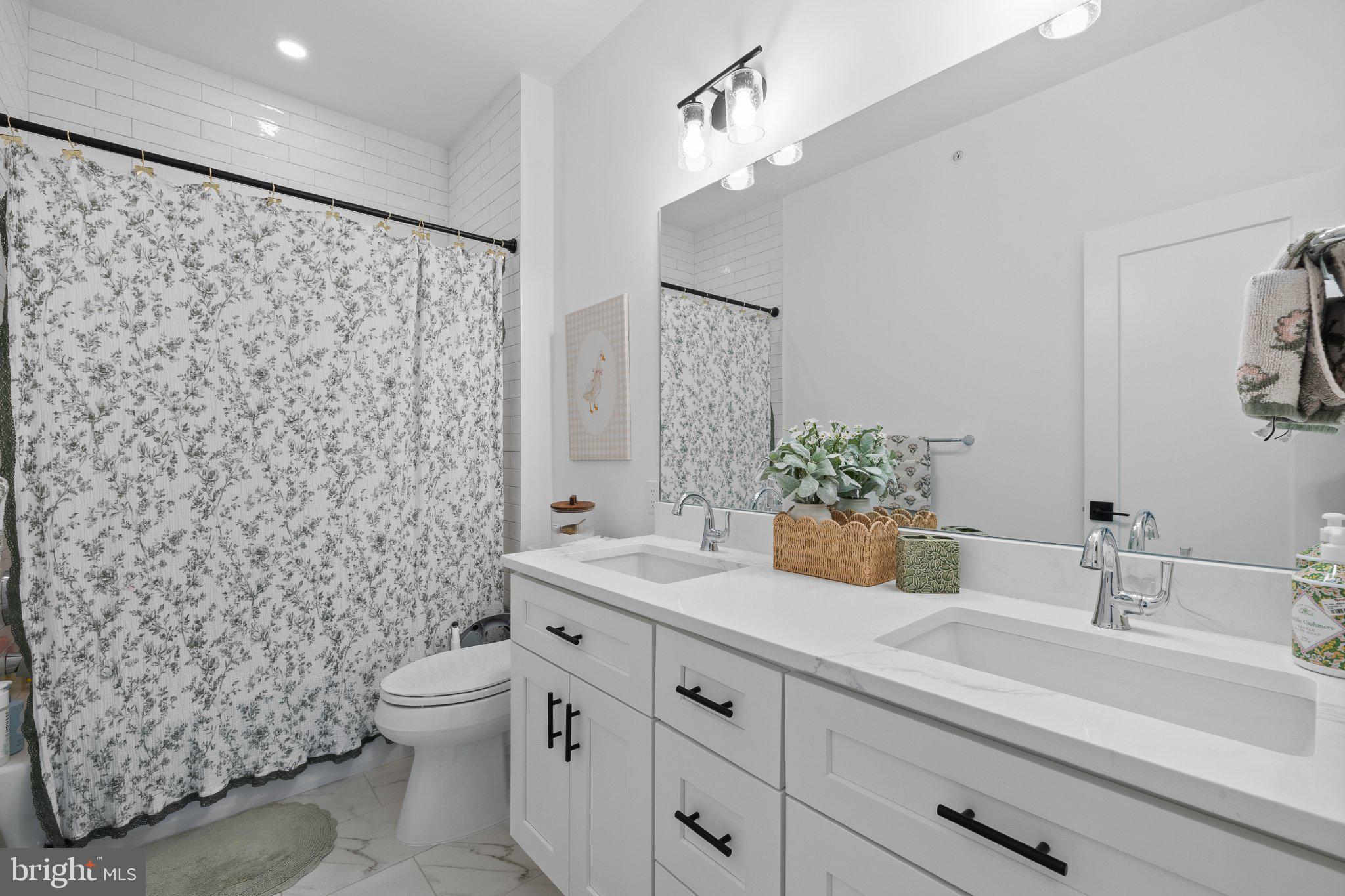 985 Henry Avenue Wayne, PA 19087 - Photo 25 of 28 Chic bathroom with elegant details.