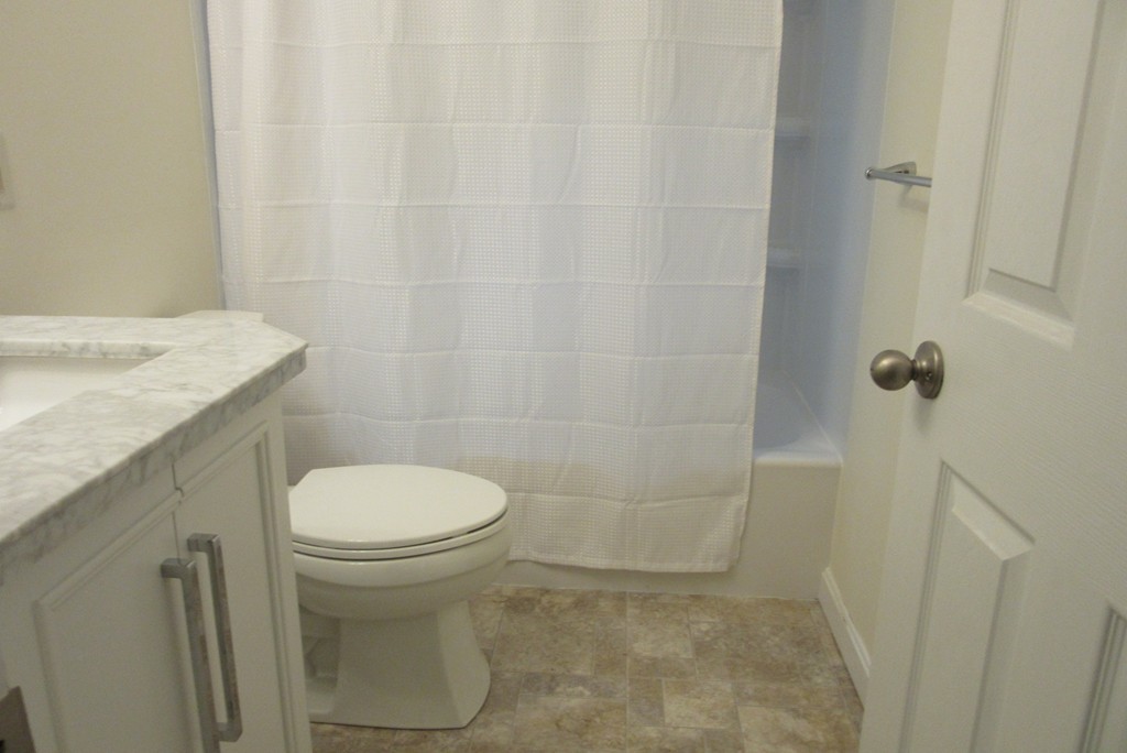4 Westgate Road Billerica, MA 01862 - Photo 4 of 12 a bathroom with a sink and toilet