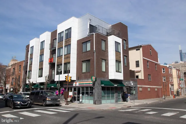 a view of a building and a street