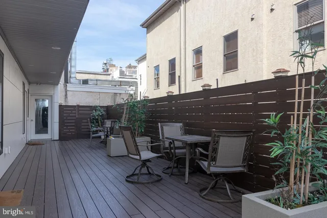 a view of dinning table and chairs in patio of the house