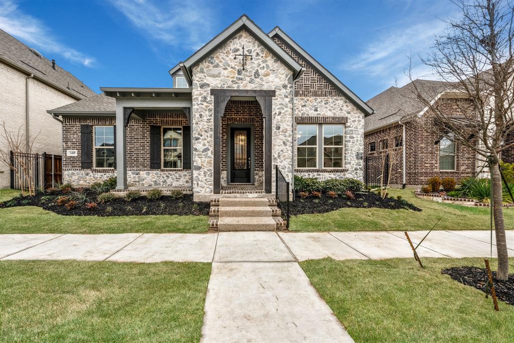 1409 Mount Evans Trail Arlington, TX 76005 - Photo 1 of 1 a front view of a house with a yard