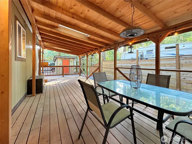 a view of a balcony with furniture