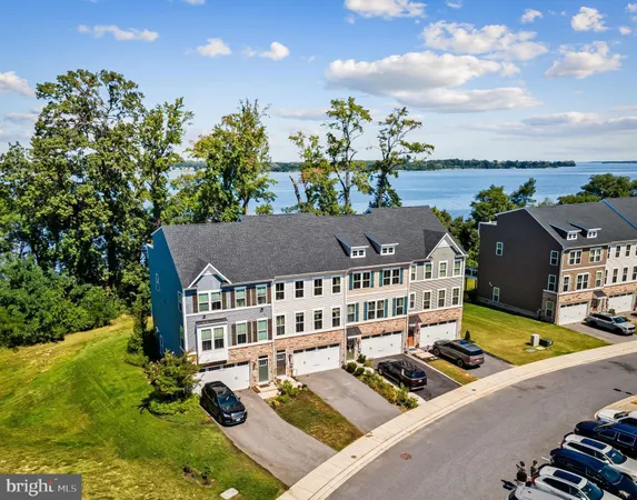 an aerial view of house with yard