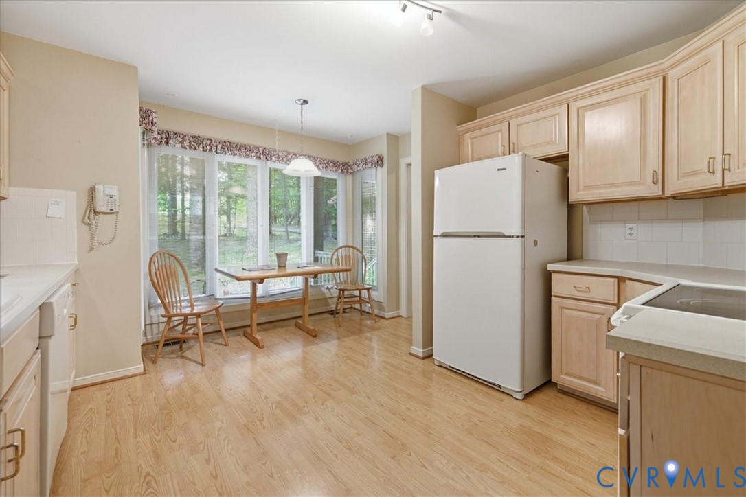 4099 Doe Run Road Hopewell, VA 23860 - Photo 8 of 36 Bright kitchen space featuring wood-finish floorin