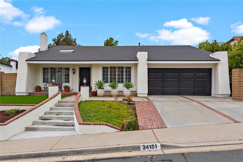 Nice curb appeal with long driveway