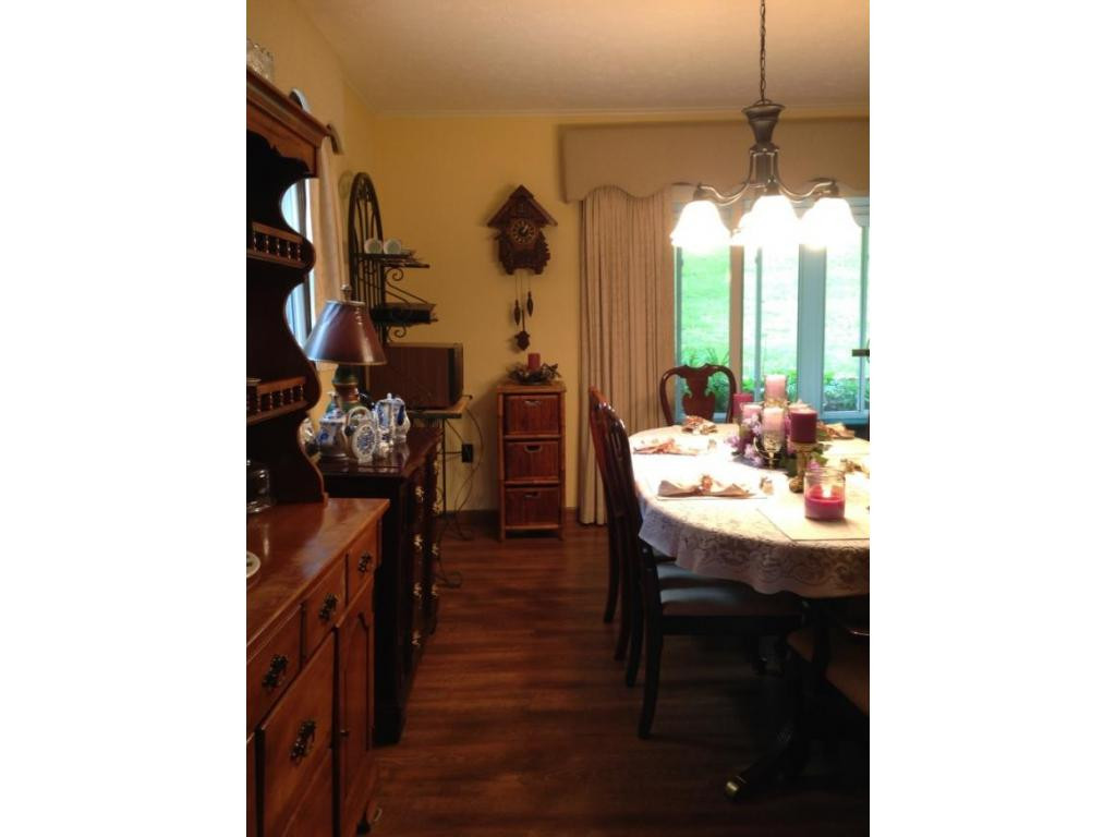 129 Helton Road Hampton, TN 37658 - Photo 15 of 24 Dining twd Sunroom