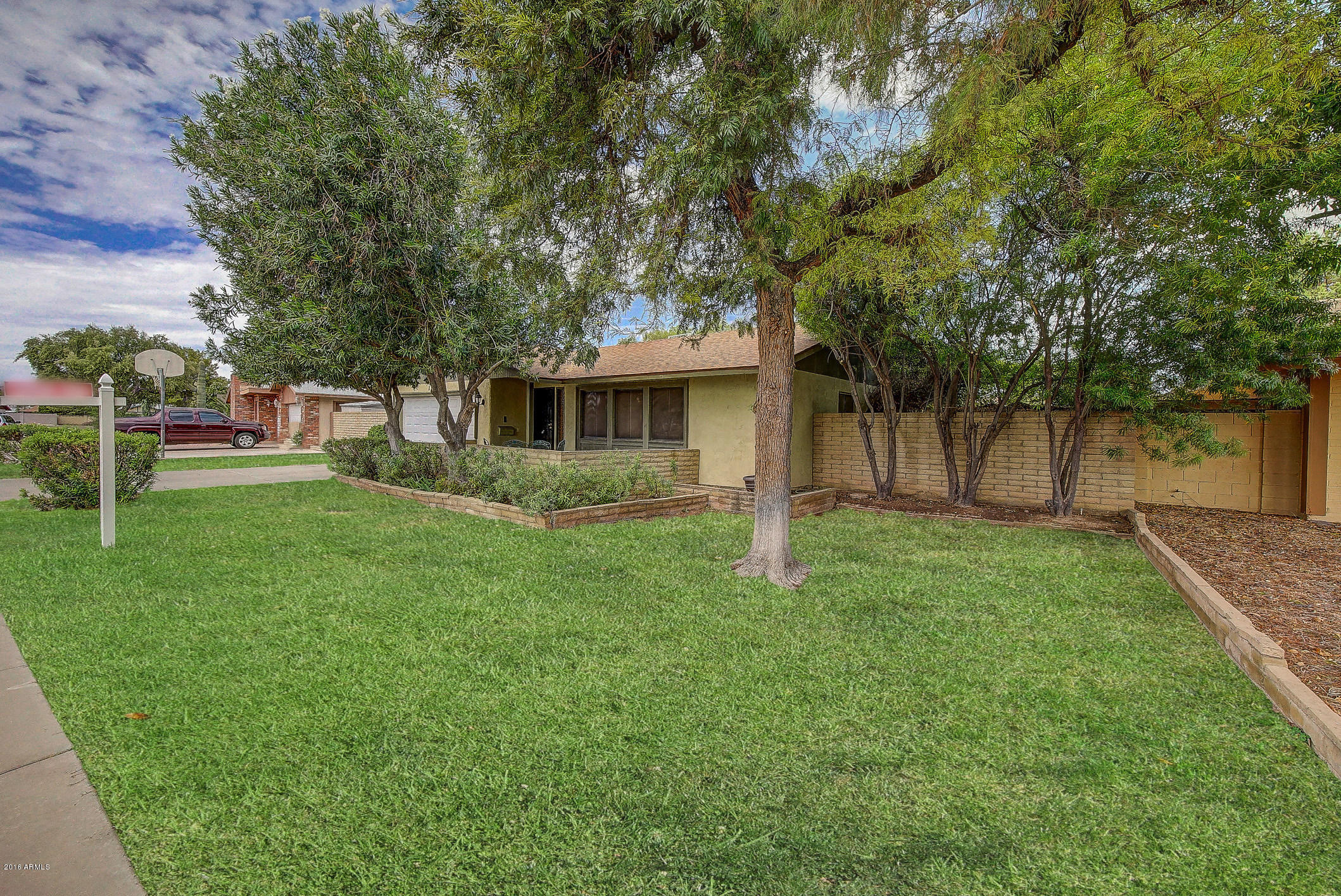 1162 East Redfield Road Tempe, AZ 85283 - Photo 3 of 38 103-FrontExterior_Right