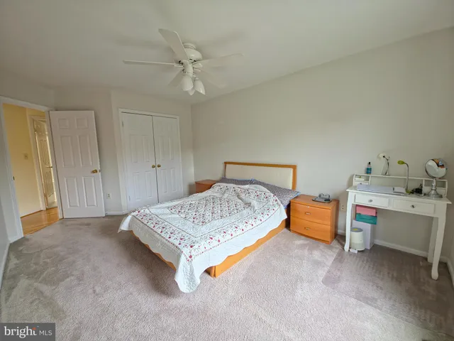 a view of an empty room and a window