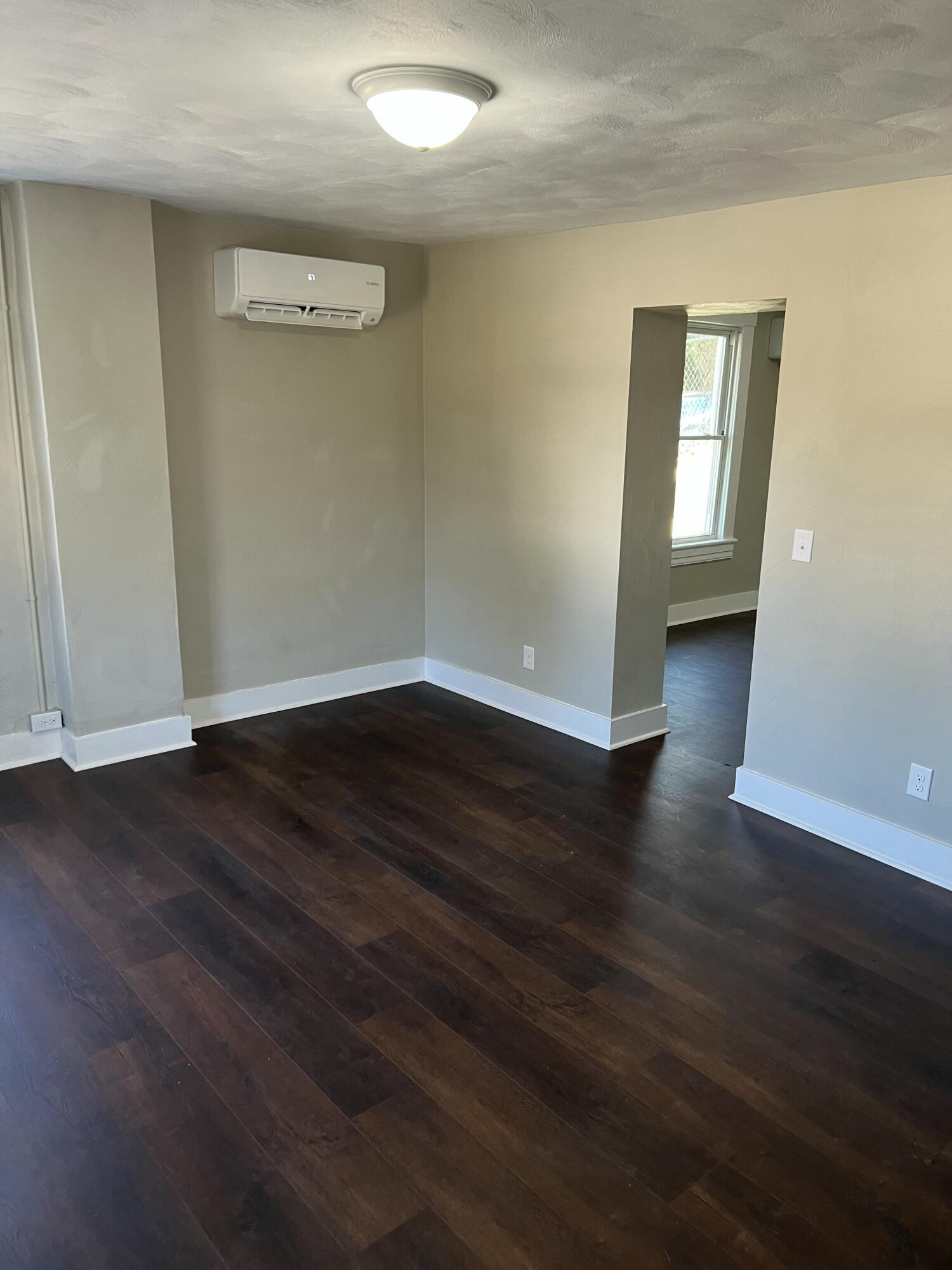 602 Rutherford Avenue Northwest Roanoke, VA 24016 - Photo 8 of 15 a view of a livingroom with wooden floor